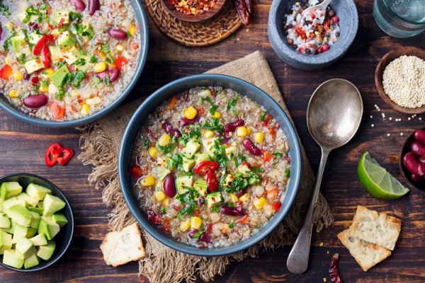 Traditional South America dish with avocado, corn and beans 